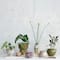 Hello Honey® 12.25" Green Round Terra-cotta Hobnail Footed Vase